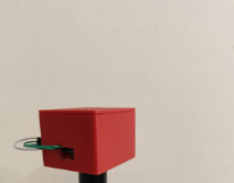 3D-printed red probe housing with soil electrodes